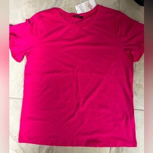 I’m selling this rose red shirt! It’s never been worn and is a size large.